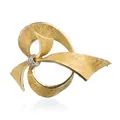 Yellow gold bow brooch with diamonds.