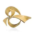 Yellow gold bow brooch with diamonds.