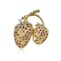 Figurative brooch in strawberry shape.