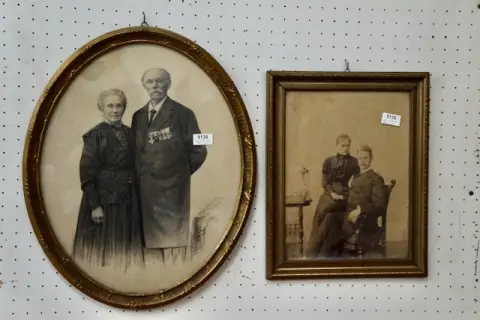 2 portrait photographs, framed