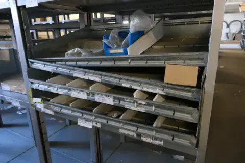 Mixed lot of warehouse and operational equipment, including storage boxes, material and Viega items