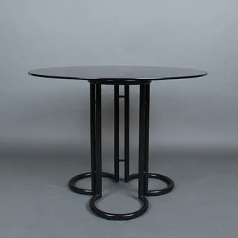 Round postmodern dining table, smoked glass, 1980s.