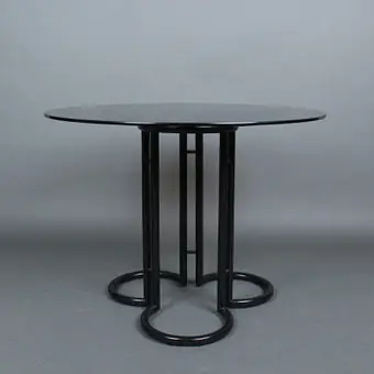 Round postmodern dining table, smoked glass, 1980s.