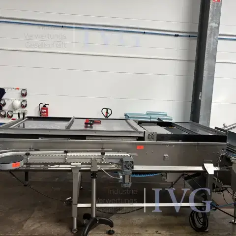 Installation d'alimentation de boîtes HANDTMANN