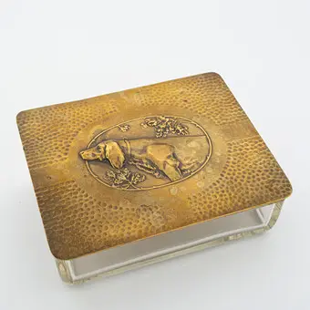 Antique Art Deco humidor with hunting dog motif by WMF, embossed brass lid in hammered finish, hand-driven, clear glass bowl, 1920s.