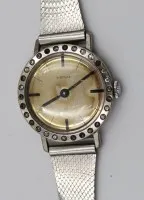 Vintage ladies' wristwatch, Heno, manual winding, movement runs, bezel with clear stones, approx. D-2.5cm, worn condition
