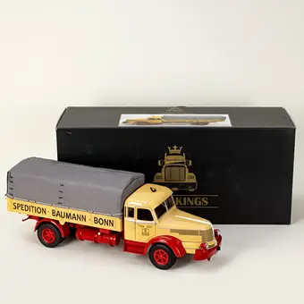 Road Kings, truck with flatbed tarpaulin "Spedition Baumann" in original packaging.