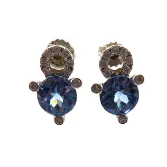 Clous d'oreilles en argent 925 avec zircon et pierre de verre bleue facettée.