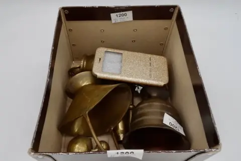 1 small lot of brass among others
