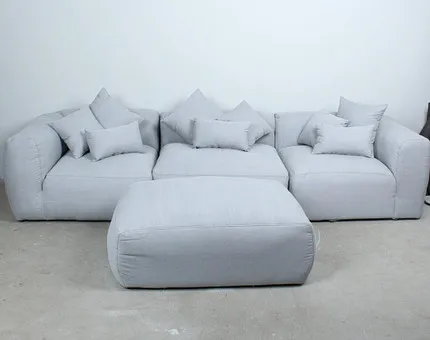 PRIMAVERA. 3-piece modular sofa and ottoman with 9 cushions, fabric.