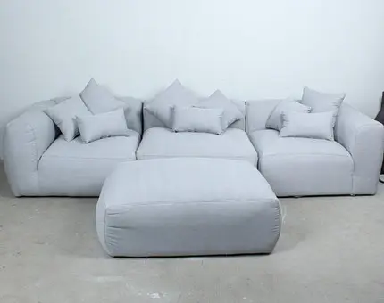 PRIMAVERA. 3-piece modular sofa and ottoman with 9 cushions, fabric.