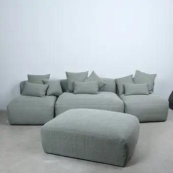PRIMAVERA. 3-piece modular sofa and stool with 9 cushions, fabric.