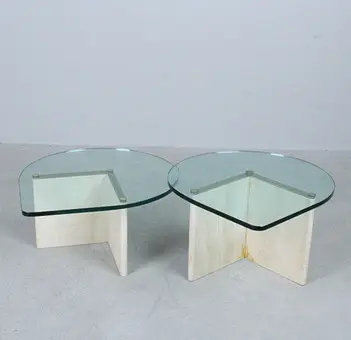 Two coffee tables in travertine and glass, Italy, 1980s.