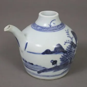 KENDI, CHINA, CONTINUOUS RIVER LANDSCAPE AND PATTERN BORDER IN UNDERGLAZE BLUE.