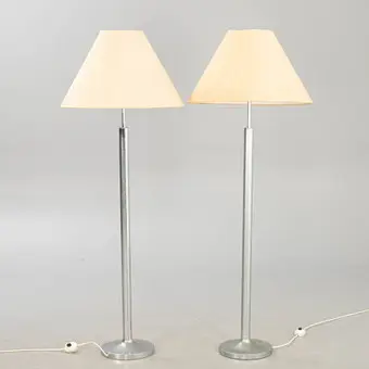 Two floor lamps with aluminium base, 1970s (2).