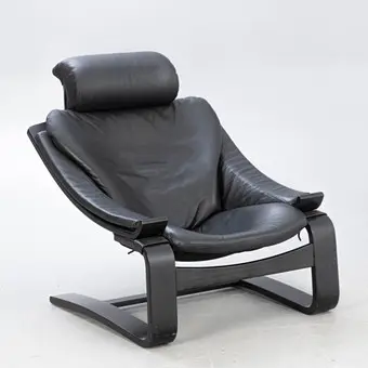 ÅKE FRIBYTER. Armchair 'Kroken', black leather, Roche Bobois.