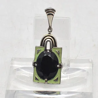 Theodor Fahrner. Designhanger van 935 zilver, geëmailleerd, met grote steen, Duitsland, rond 1920, meesterteken.