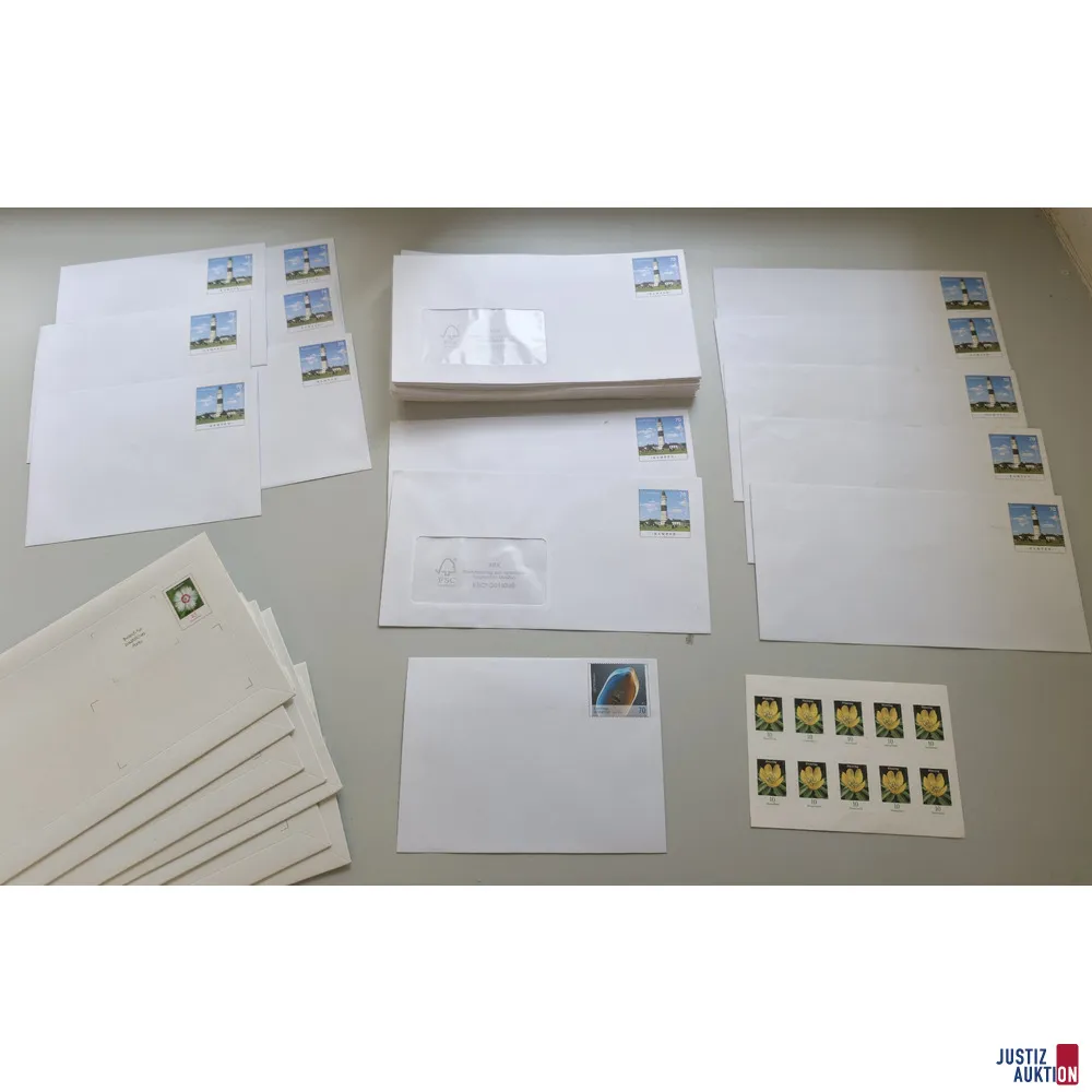 Vorfrankierte Briefumschläge + Briefmarken
