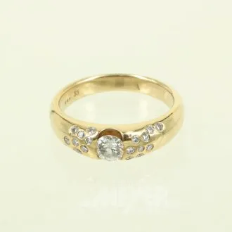 Damenring mit 1 Brillant von ca. 0,20ct u. 18 kl. Diamanten