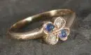 Bague femme – 585 or jaune, env. 1,7 g total, forme de trèfle à quatre feuilles, ornée de spinelles et diamants, taille 53