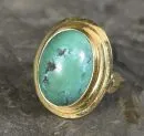 Damenring – 585 GG, ca. 8,0 g total, ovaler Türkiscabochon in breiter Zargenfassung, Größe 52;