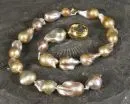 Collier de perles – fermoir argent 925, doré, citrine ovale facettée, perles d'eau douce baroques, L= env. 48 cm, fermoir baïonnette