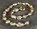 Collier de perles – fermoir argent 925, doré, citrine ovale facettée, perles d'eau douce baroques, L= env. 48 cm, fermoir baïonnette