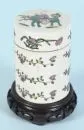 Lidded box – Porcelain, hand-painted, all-around floral decoration, lid with figurative motif, cylindrical body, H= 11 cm, China