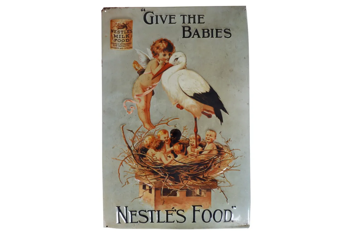 Embossed advertising tin sign "Nestles Food"