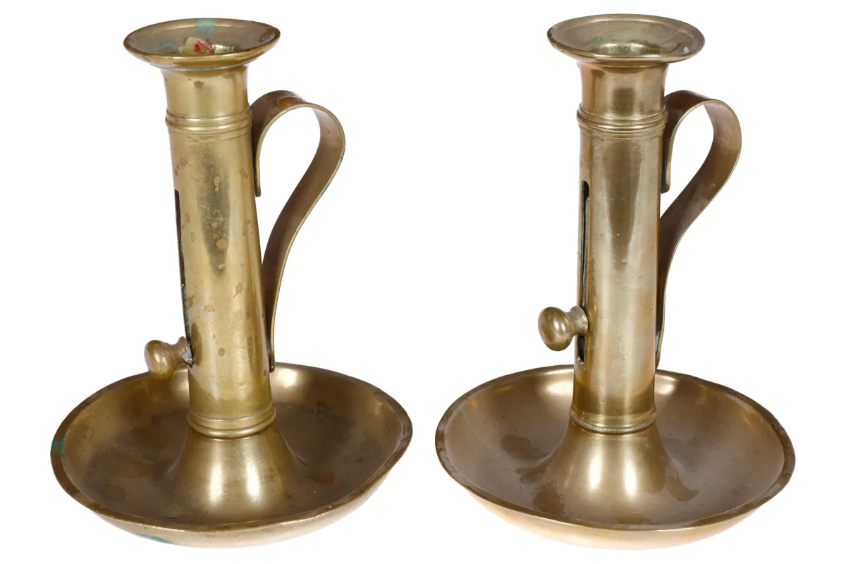 2 brass candlesticks with handle