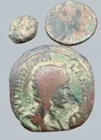 3 antique coins, largest probably Roman, imperial period, all in poor condition