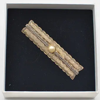 Theodor Fahrner (1859-1919). Original brooch, gold-plated sterling silver, cultured pearl, marcasite, filigree, Germany, circa 1920s.