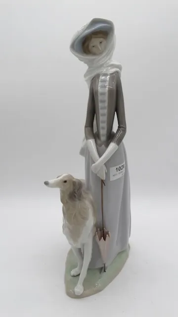 1 porcelánová figurka "Žena se psem" Llando, poškozená