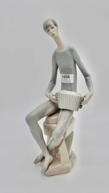 1 porcelánová figurka „Hudebník“
