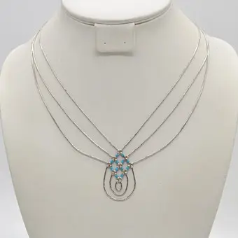 Collier avec perles intercalaires turquoise, argent sterling, monté en structure, 20e siècle.