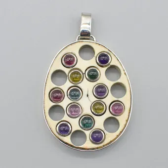 DESIGNER PENDANT, STERLING SILVER - BONE - COLOURED STONES, MID-20TH CENTURY.