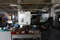 1 台 CNC 加工中心(铣削中心),品牌 POSMILL