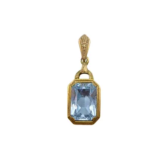 Pendentif, argent 835 doré, pierre bleu clair taille émeraude.