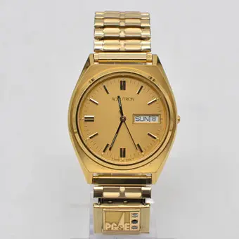 BULOVA ACCUTRON (92561), ARMBANDUHR MIT BRILLANT & SAPHIR, PG&E LOGO, VERGOLDETES GEHÄUSE UIND FLEXBAND, 1996.
