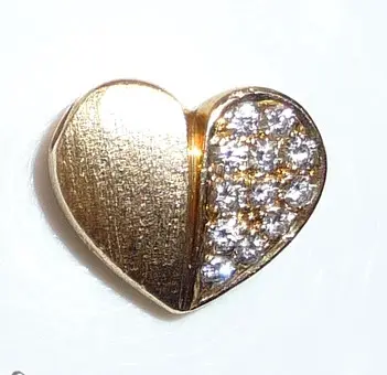 Colgante de oro 750 corazón 0,24 ct. brillantes.