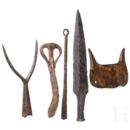 Five medieval and modern iron objects: including anvil, two-pronged fork, hook, 10th - 17th century