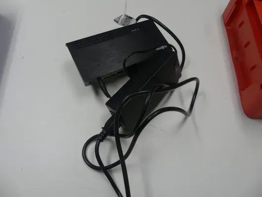 Docking station, incluso alimentatore