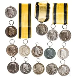 Sammlung von 15 silbernen, württembergischen Militärverdienstmedaillen