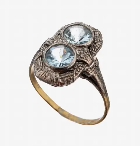 Bague en or 8 kt avec pierre colorée, vers 1910-20, or jaune 333/000, tête de bague en argent, 2 pierres à facettes rondes
