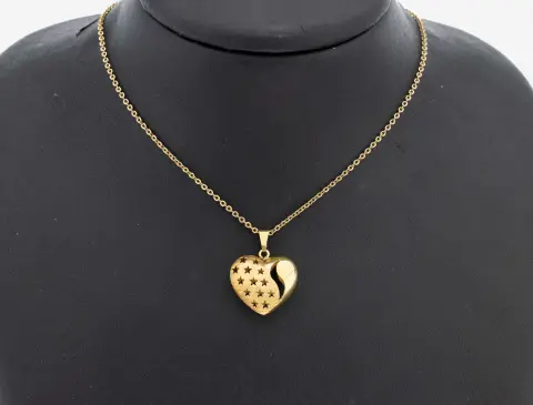 Pendentif en or 14 ct, or jaune 585/000, part. struct., cœur, ajouré d'étoiles, sur