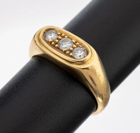 Bague brillant en or 18 kt, GG 750/000, design épuré, 3 brillants total env. 0,40 ct