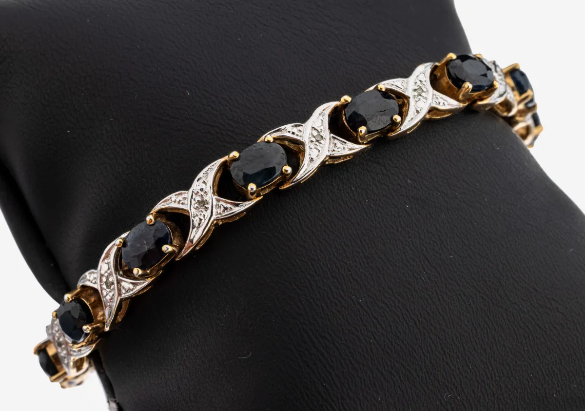 Saphir-Diamant-Armband, 925er Silber verg.,12 ovalfacett. Saphire zus. ca. 14.0 ct, 12