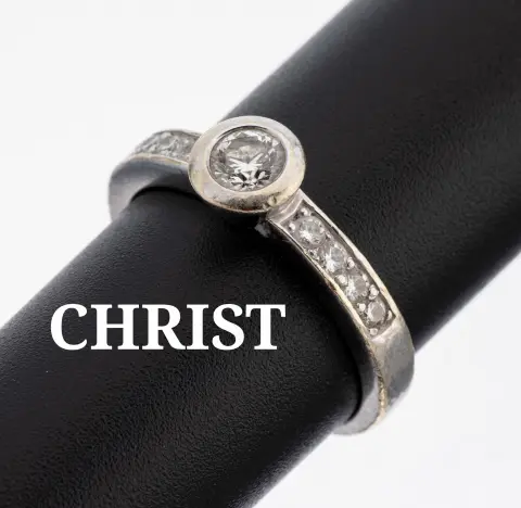 Bague brillant CHRIST en or 14 kt, or blanc 585/000, 1 brillant 0,25 ct blanc/si, 8 brillants