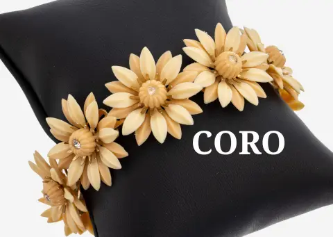 Bracelet CORO, USA années 1950, métal plaqué, fleurs flexibles en thermoset