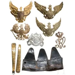 Cinq emblèmes de casque, principalement prussiens, vers 1900
